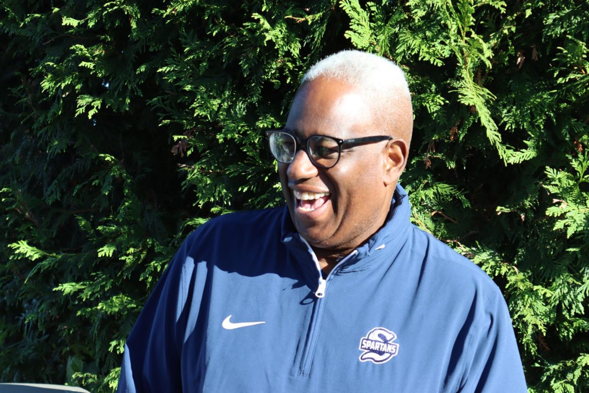 Coach Gaskins laughing with the team.