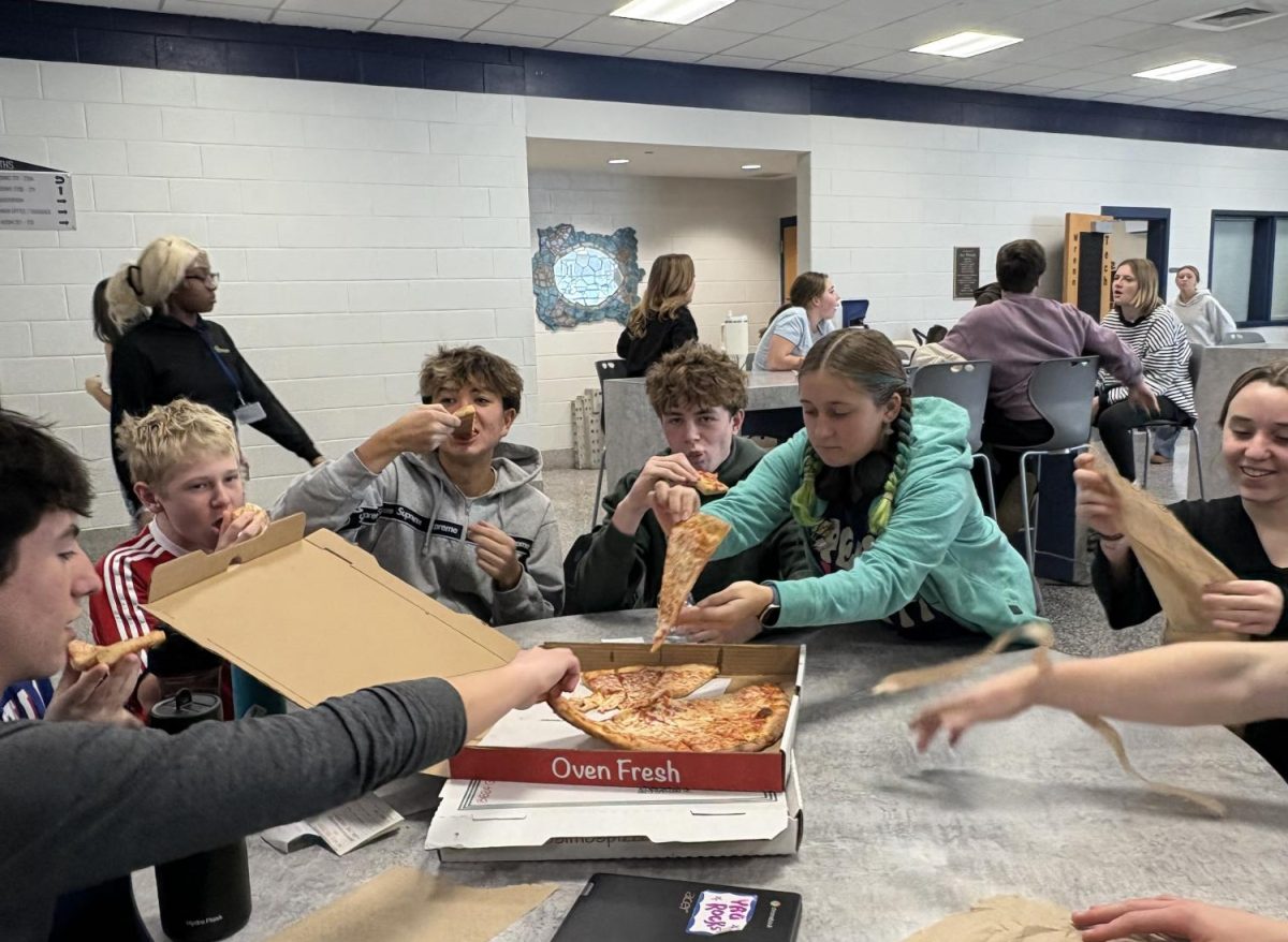 Enjoying Pizza!