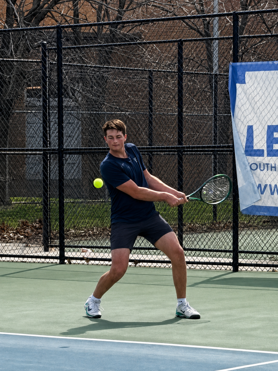 Nathan playing tennis